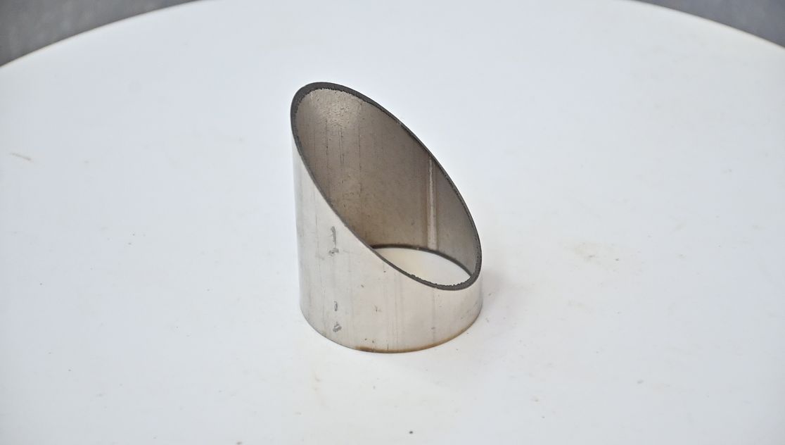 Angled bevel cut on the end of a rectangular metal tube
