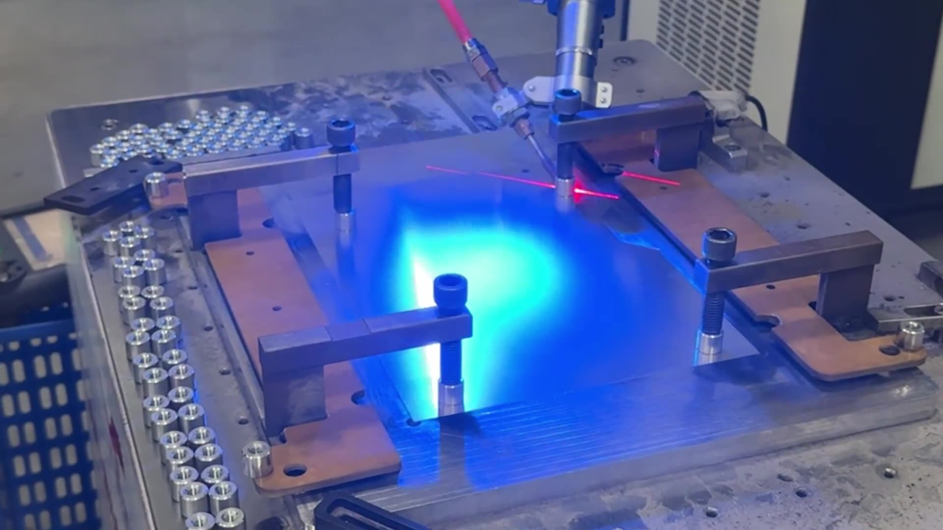 Robotic laser welding cell in operation